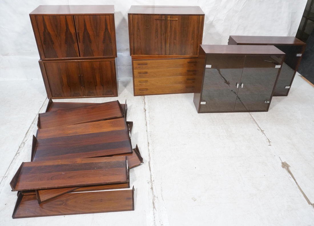 Danish Rosewood F M wall Unit. 3 Tambour door cab: Danish Rosewood F M wall Unit. 3 Tambour door cabinets. 1-4 drawer cabinet 1 flip open desk, 2-2 door glass door cabinets, 1 magazine shelf, 4 small shelves, 6 medium shelves.--Mounting rails required
