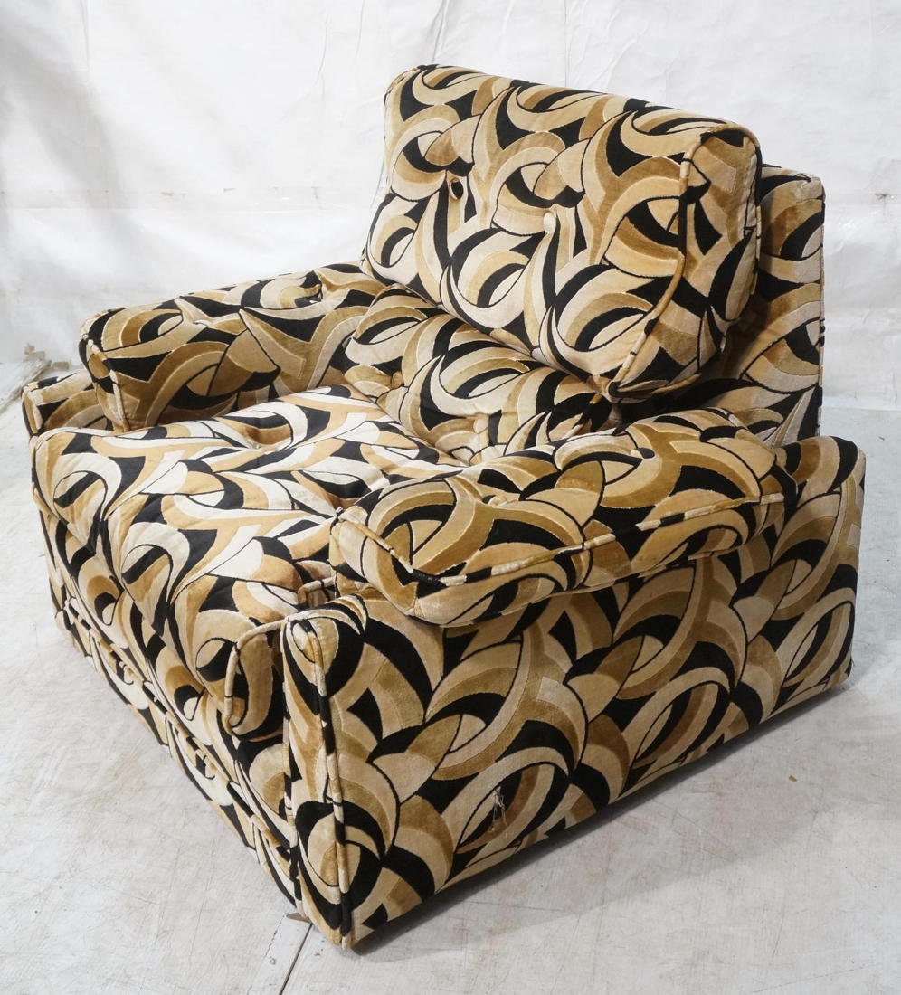 Retro Cimon Limited overstuffed lounge chair. Bla: Retro Cimon Limited overstuffed lounge chair. Black, brown and gold upholstery.-- Dimensions: H: 37 inches: W: 41 inches: D: 38 inches ---