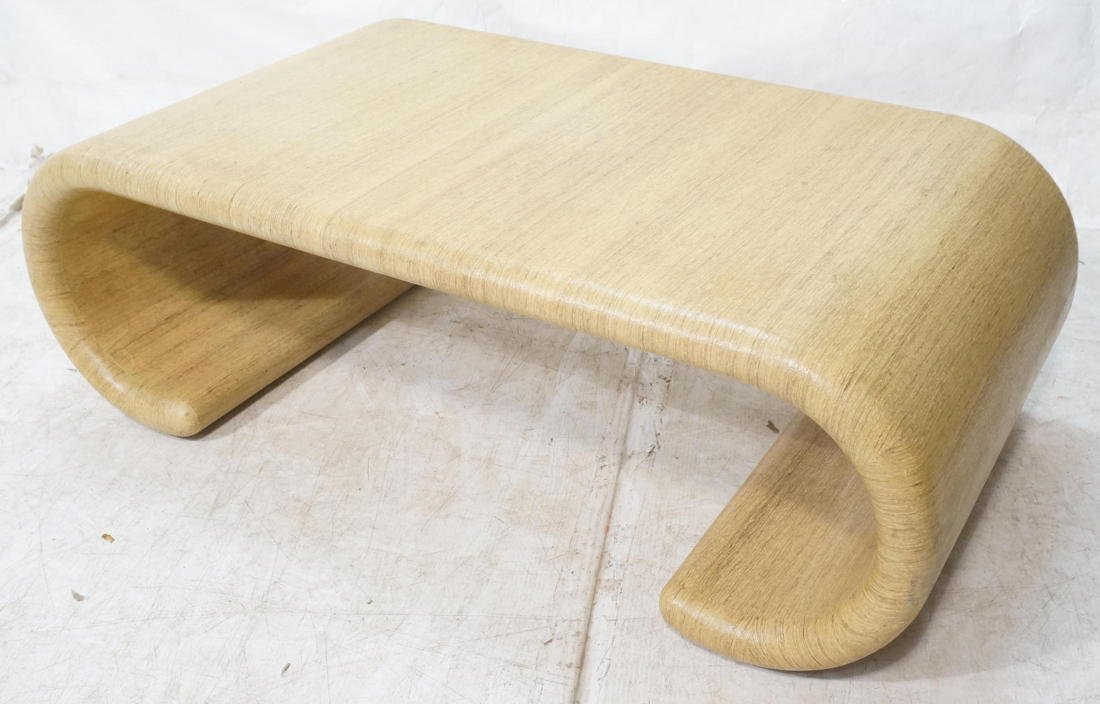 Karl Springer style coffee table. Bent form, unma: Karl Springer style coffee table. Bent form, unmarked. Rolled ends.-- Dimensions: H: 16.5 inches: W: 48 inches: D: 26 inches ---
