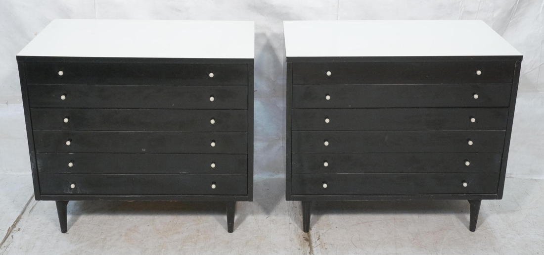 Pair of American modern Martinsville Bachelor Che: Pair of American modern Martinsville Bachelor Chests. Black Ebonized wood, white laminate tops. 3 drawers in each. White porcelain pulls.-- Dimensions: H: 30.5 inches: W: 34 inches: D: 19.75 inches --