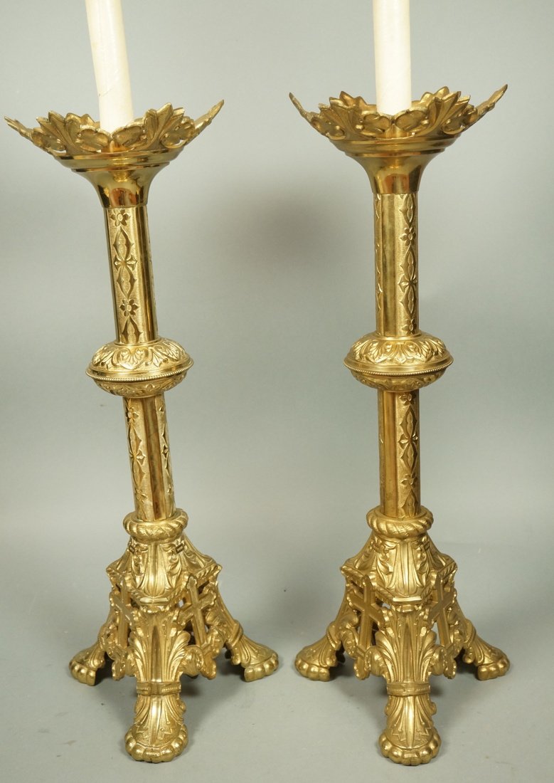 Pair Large Gothic Style Brass Table Lamps. Tripo: Pair Large Gothic Style Brass Table Lamps. Tripod base. Fancy decoration.-- Dimensions: H: 41 inches: W: 10 inches ---