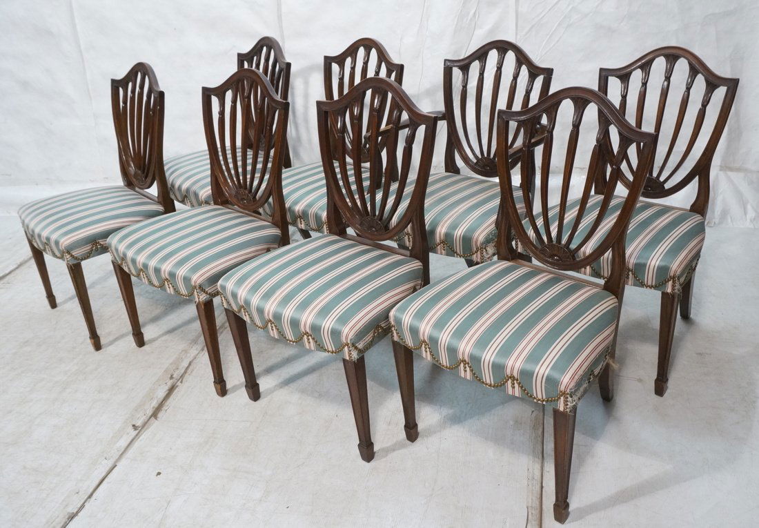 Set 8 Shield Back Mahogany Dining Chairs. One Arm: Set 8 Shield Back Mahogany Dining Chairs. One Arm Chair. Seven Side Chairs. Striped upholstery with brass stud details. Probably BAKER (Came with Baker table Lot 98. Unmarked)-- Dimensions: H: 38 inch