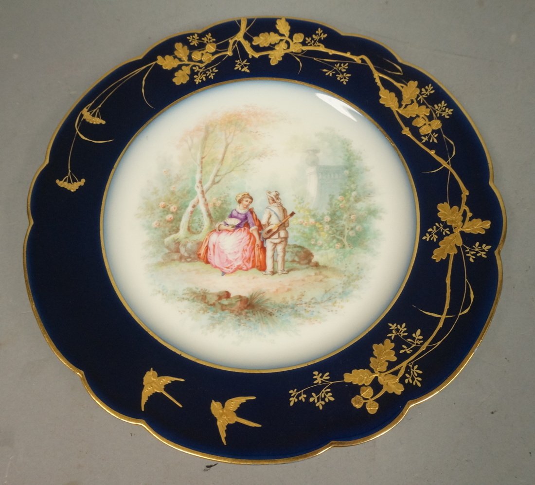 Cobalt Blue Limoges Plate. Musician Courting Scen: Cobalt Blue Limoges Plate. Musician Courting Scene. Gilt bird design to rim. Marked Limoges M Redon-- Dimensions: H: 9 inches: W: 9 inches --- US Shipping charge: $20