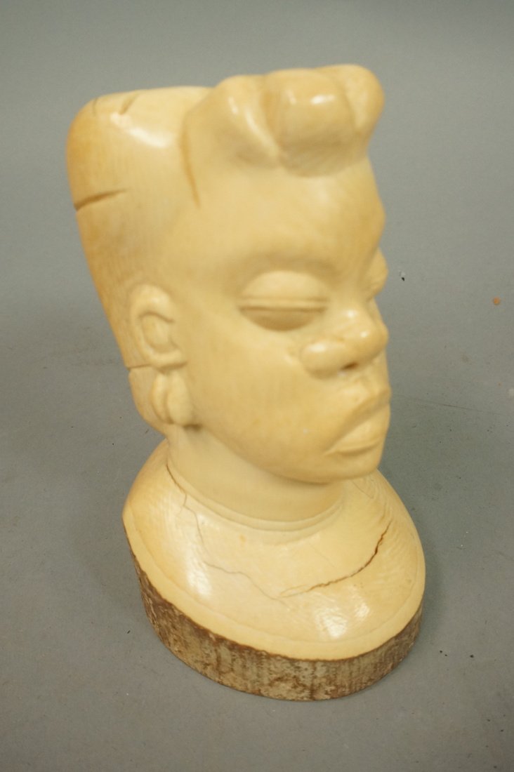 Antique African Carved Sculpture. Female with Hea: Antique African Carved Sculpture. Female with Headdress & large earrings. Ivory tusk form.-- Dimensions: H: 13.5 inches --- US Shipping charge: $35
