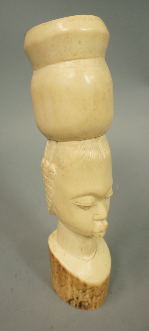 Antique African Carved Sculptures. Female Head ca: Antique African Carved Sculptures. Female Head carrying something. Carved ivory tusk form. Hollow form. -- Dimensions: H: 7 inches --- US Shipping charge: $35