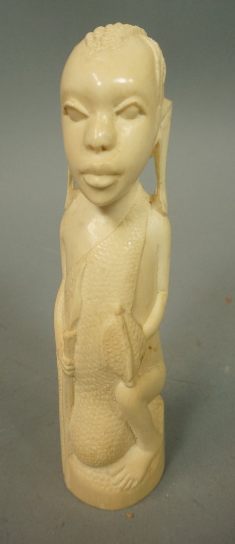 Antique African Carved Sculpture. Warrior with Sh: Antique African Carved Sculpture. Warrior with Shield & Spear. Long ear lobes. Carved ivory form. -- Dimensions: H: 7 inches --- US Shipping charge: $35