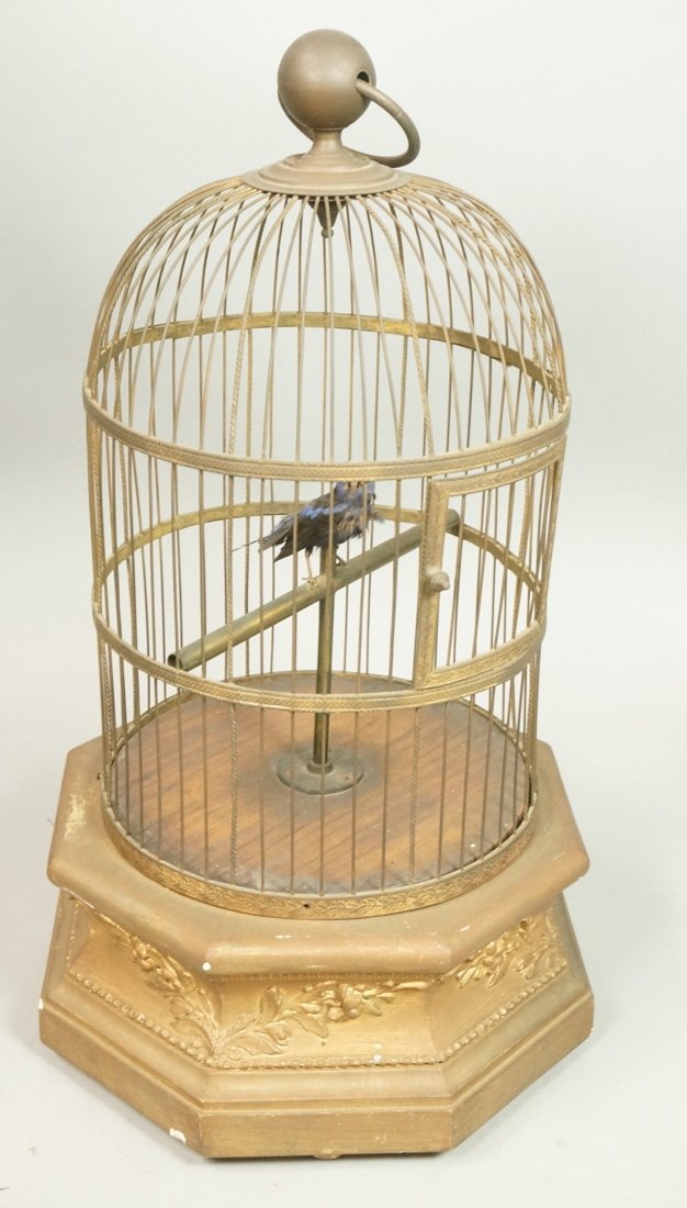 Antique Automaton Mechanical Music box Bird Cage.: Antique Automaton Mechanical Music box Bird Cage. Metal birdcage on gilt wood base. Working.-- Dimensions: H: 20.5 inches: W: 11.5 inches ---