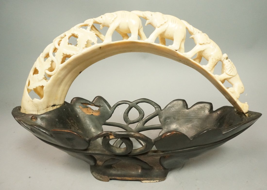 African Caving of Elephant Bridge on Carved Wood: African Caving of Elephant Bridge on Carved Wood Base. Antique Ivory horn material.-- Dimensions: H: 10.5 inches: W: 16 inches: D: 6.25 inches ---