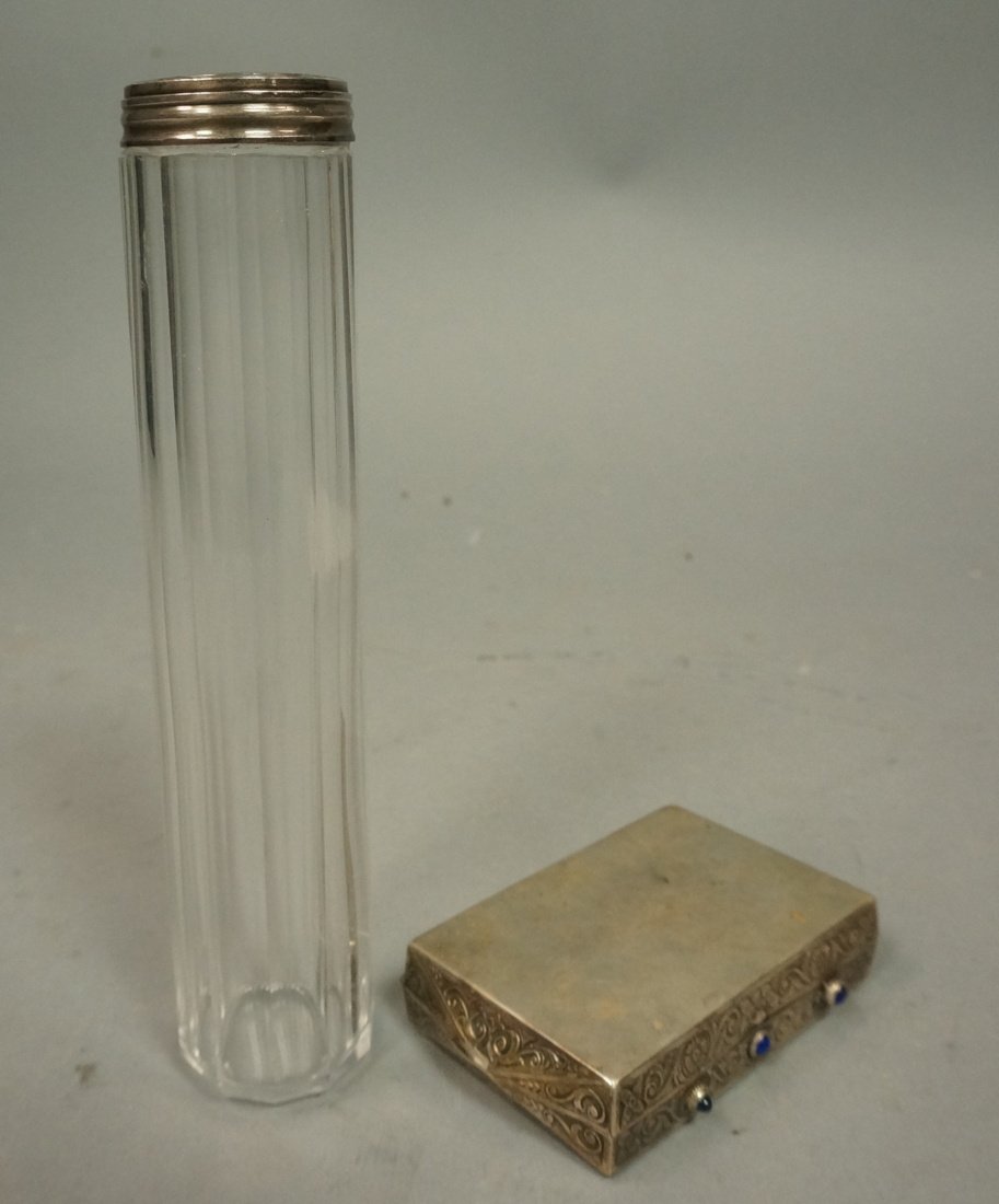 2pc Sterling Lot. 1) Sterling Compact with three: 2pc Sterling Lot. 1) Sterling Compact with three blue glass ornaments. Machine engraved design. Mirror interior 2) Tall crystal dresser Jar with sterling lid.-- Dimensions: --- Weight: 2.99 Troy ozs. 