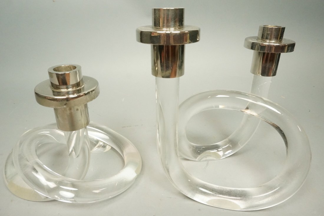 Pr DOROTHY THORPE Lucite Pretzel Candle Sticks. O: Pr DOROTHY THORPE Lucite Pretzel Candle Sticks. One stick with one candleholder. One stick with two candleholders. Twisted lucite rod form. Not marked-- Dimensions: H: 9.5 inches: W: 8 inches: D: 6 in