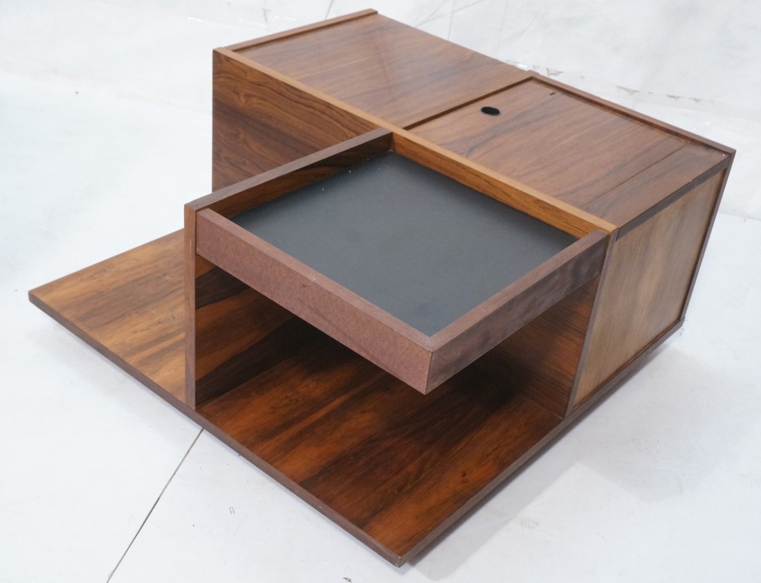 Rosewood Multi Functional Coffee Accent Table. Th: Rosewood Multi Functional Coffee Accent Table. Three compartments including swing out bar area. One flip up door. One raised area with black finish. Scratches & scuffs. -- Dimensions: H: 16.5 inches: 