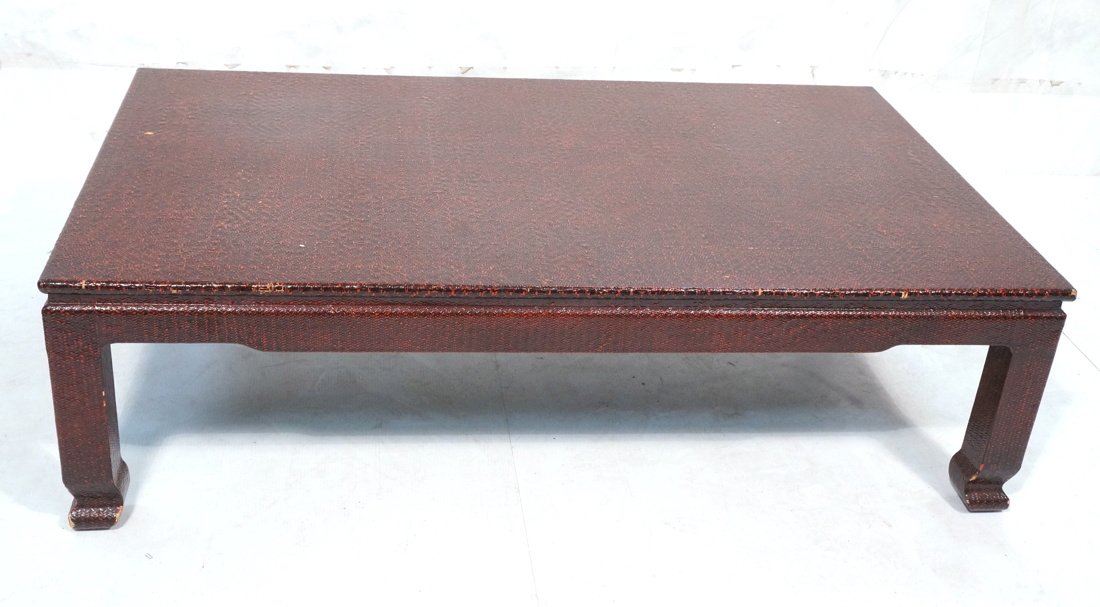 KARL SPRINGER style Lacquered Woven Rattan Coffee: KARL SPRINGER style Lacquered Woven Rattan Coffee Table. Oversized rectangular. Red Asian style Cocktail Table. Shaped feet. Not marked.-- Dimensions: H: 17 inches: W: 60 inches: D: 35.5 inches ---