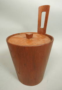 ANRI FORM Italian Java Teak Ice Bucket. Interest: ANRI FORM Italian Java Teak Ice Bucket. Interesting Pierced handle Lidded. Marked. -- Dimensions: H: 14.5 inches: W: 8.5 inches ---