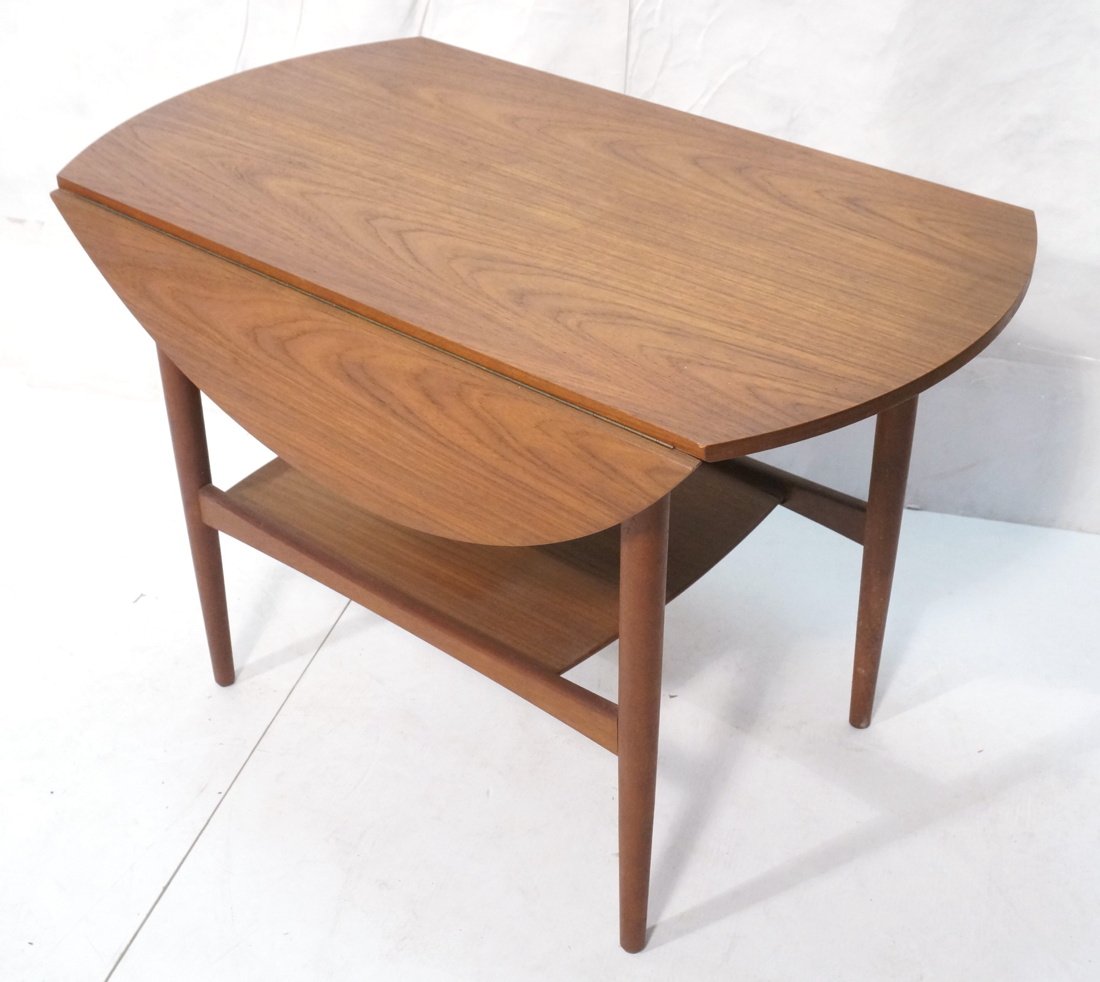 RAYMOR Danish Teak Drop Side Server. Lower shelf: RAYMOR Danish Teak Drop Side Server. Lower shelf slides. Top has depressions for handles. Drops are 8.5" long-- Dimensions: H: 25.5 inches: W: 37 inches: D: 20.5 inches ---