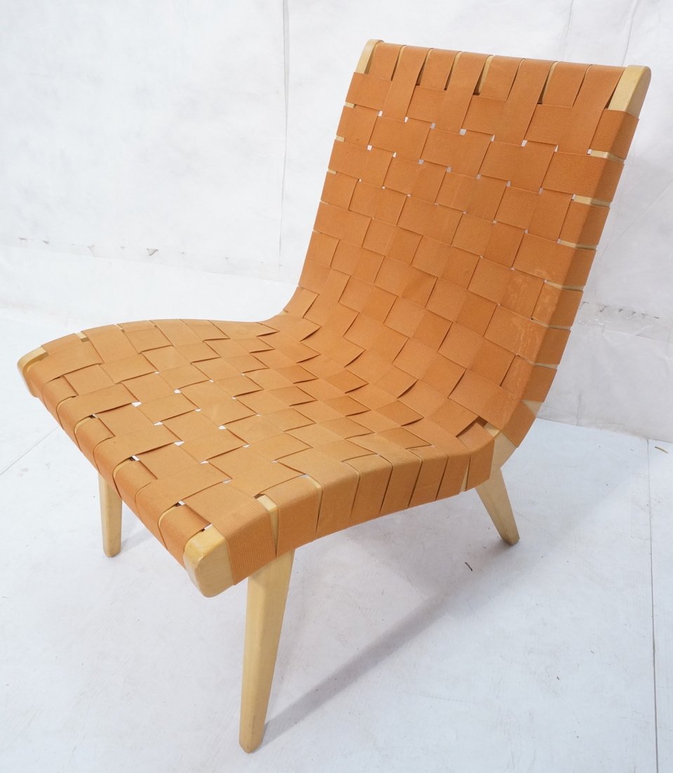 JENS RISOM for KNOLL STUDIO Armless Lounge Chair.: JENS RISOM for KNOLL STUDIO Armless Lounge Chair. Webbed seat on blond wood frame. Metal tag.-- Dimensions: H: 30.25 inches: W: 20.25 inches: D: 28 inches ---