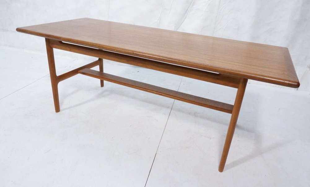 Danish Modern Teak Rectangular Coffee Cocktail Ta: Danish Modern Teak Rectangular Coffee Cocktail Table. Nice form base with stretcher-- Dimensions: H: 22 inches: W: 58.5 inches: D: 25 inches ---