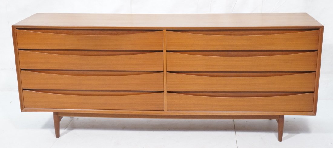 Arne Vodder Low Dresser Chest. Sibast Furniture: Arne Vodder Low Dresser Chest. Sibast Furniture Made in Denmark. 8 drawers. Finished Back. Branded George Tanier.-- Dimensions: H: 31.75 inches: W: 77.5 inches: D: 19.5 inches ---