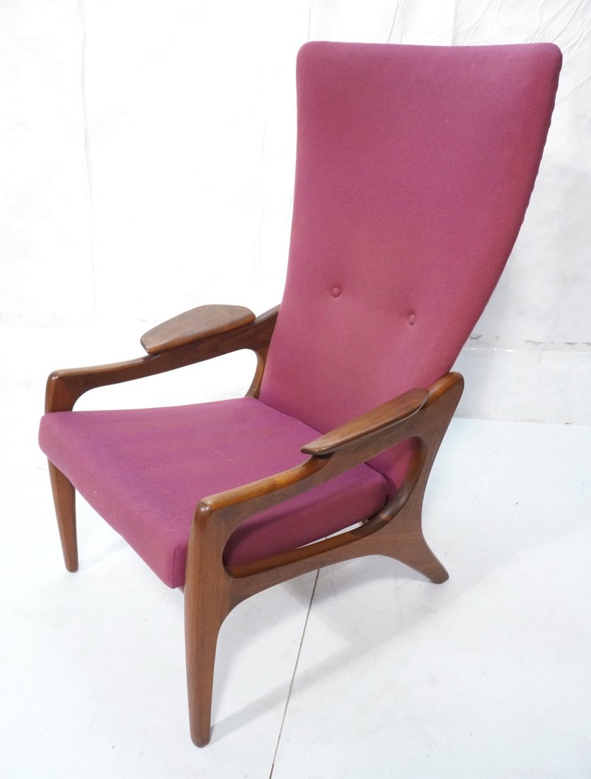 ADRIAN PEARSALL Tall Back Lounge Chair. Purple fa: ADRIAN PEARSALL Tall Back Lounge Chair. Purple fabric. Tall Flared Back. Added wood arm rests. Strap bottom under seat cushion. Not marked-- Dimensions: H: 43 inches: W: 27 inches: D: 30 inches ---