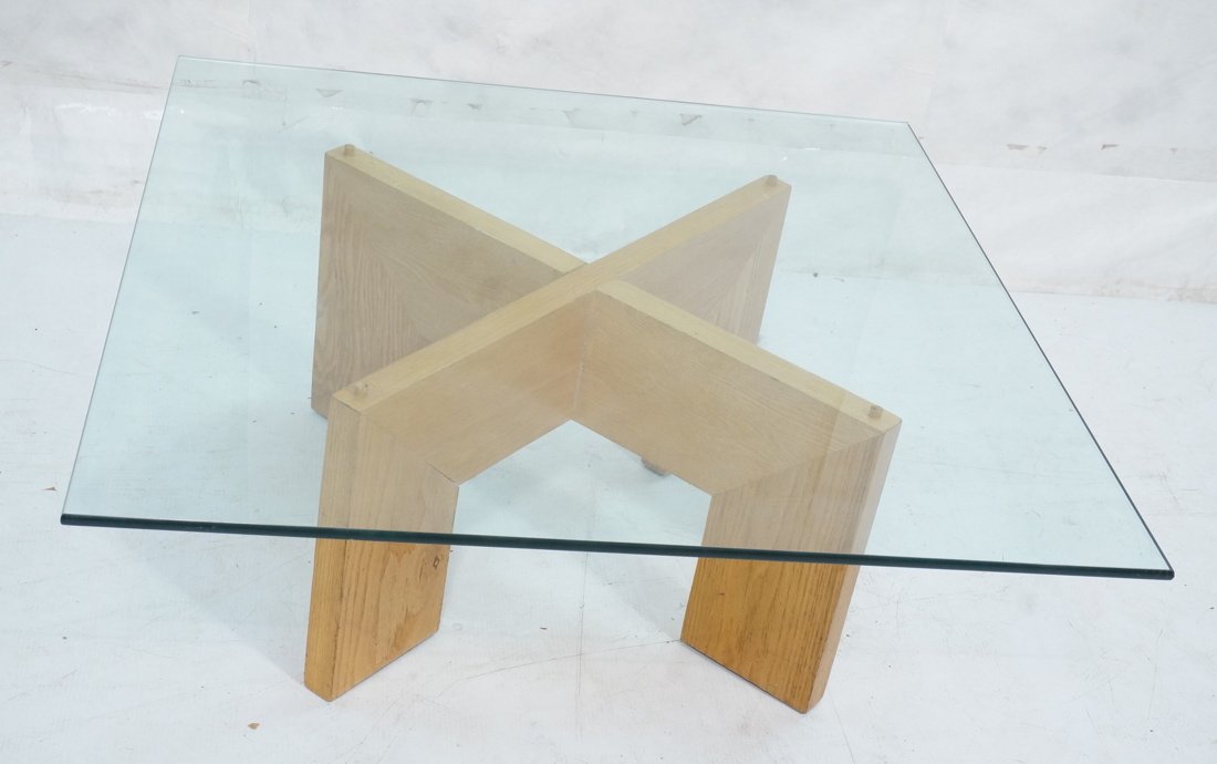 X Wood Base Glass Top Modernist Coffee Cocktail: X Wood Base Glass Top Modernist Coffee Cocktail Table. Blond Wood. -- Dimensions: H: 17 inches: W: 40 inches: D: 40 inches ---