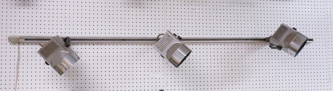 ERCO Germany Track Lighting DIETER WITTE, designe: ERCO Germany Track Lighting DIETER WITTE, designer. One rail. Three lights. Brushed aluminum rail with three chrome lights. 80" rail. Lights are 6" x 8" x 13"D-- Dimensions: ---