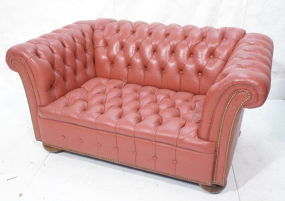 Chesterfield Style Loveseat Sofa. Bun feet and b: Chesterfield Style Loveseat Sofa. Bun feet and brass studs. Tufted. Heavy good quality.-- Dimensions: --30 x 60w x 34 deep