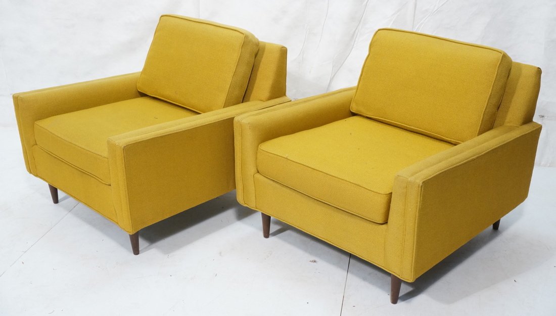 Pair of modern Selig of Monroe yellow upholstered: Pair of modern Selig of Monroe yellow upholstered lounge chairs on peg legs. -- Dimensions: H: 30 inches: W: 33 inches: D: 34 inches ---