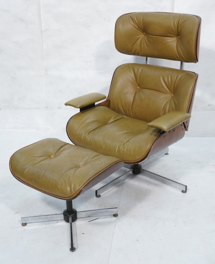 Plycraft style Eames Molded plywood chair and ott: Plycraft style Eames Molded plywood chair and ottoman. Molded plywood back on chrome x-bases. Tall back. Leather upholstery. -- Dimensions: H: 42 inches: W: 32 inches: D: 29 inches ---