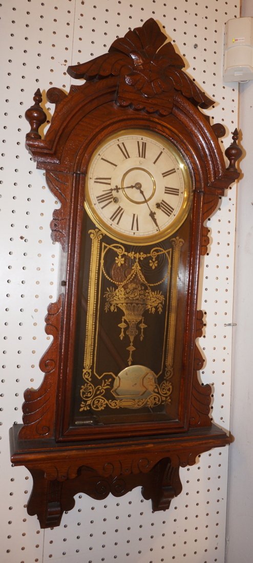 Gilbert Victorian Wall Clock. American Walnut.: Gilbert Victorian Wall Clock. American Walnut. Painted glass door. With key.-- Dimensions: H: 38 inches: W: 16 inches: D: 5 inches --- US Shipping charge: $50