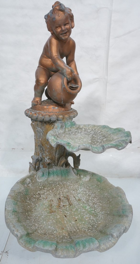 Metal 2 tier garden water fountain. Child pouring: Metal 2 tier garden water fountain. Child pouring vase into shelved tiers. 2 tiers are shell shaped. Base is decorated with flowers and birds.-- Dimensions: H: 48 inches: W: 32 inches: D: 22 inches --