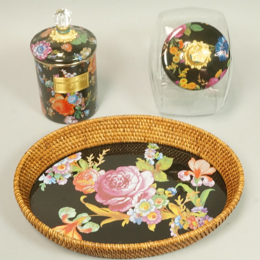 3 pcs Mackenzie Childs lot. 1 Covered biscuit tin: 3 pcs Mackenzie Childs lot. 1 Covered biscuit tin. 2 covered glass cookie jar. 3 Enamel metal and wicker tray.-- Dimensions: H: 2.5 inches: W: 15.5 inches: D: 12 inches --- US Shipping charge: $35
