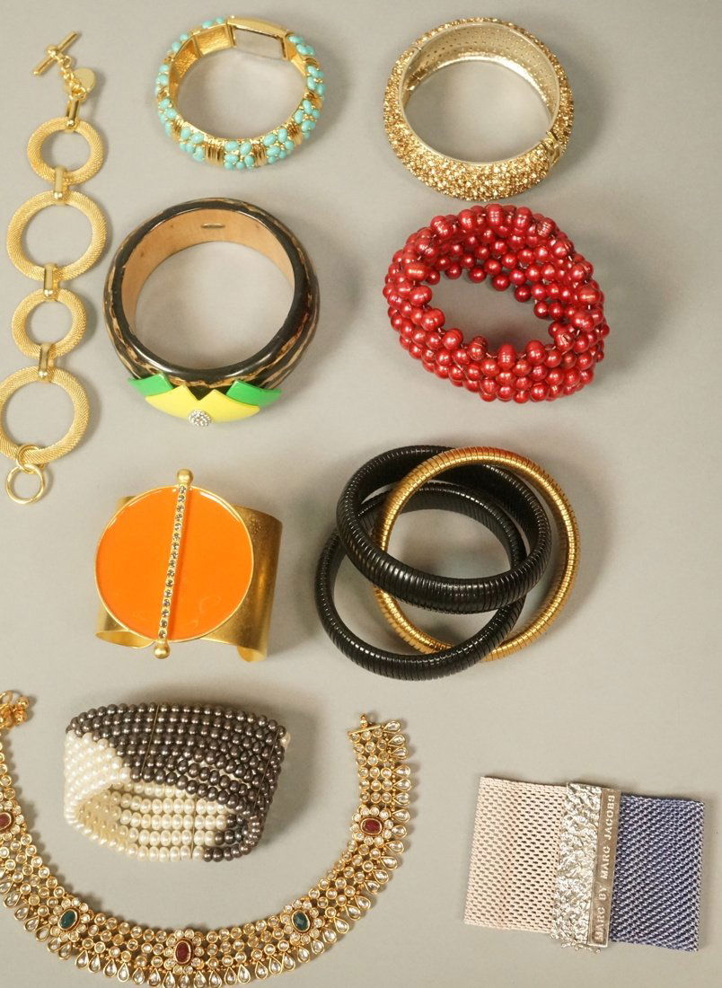 10pc Costume Jewelry Bracelet Lot. 1. JOAN RIVERS: 10pc Costume Jewelry Bracelet Lot. 1. JOAN RIVERS Stretch bracelet watch with faux turquoise stones. 2. Lulu Frost Wood Bangle. 3&4. Two Pearl Stretch Bracelets. 5. Marc by Marc Jacobs mesh wire brac.