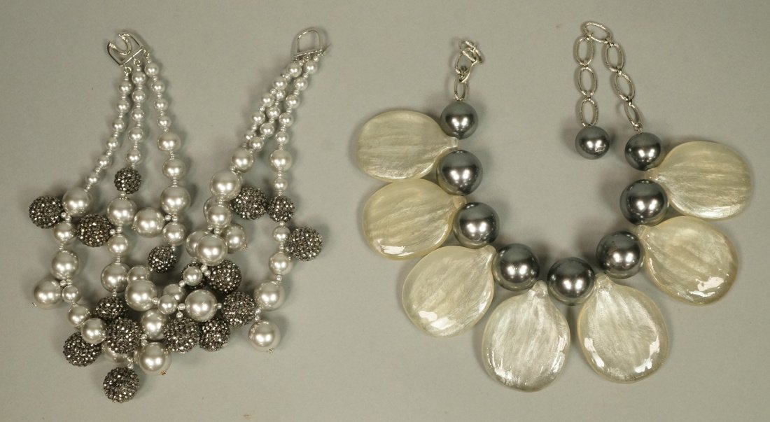 2 Designer Large Bead Necklaces. 1) Kenneth Lane: 2 Designer Large Bead Necklaces. 1) Kenneth Lane KJL three strand beaded necklace. Gray "pearl" beads interspersed with silver metallic studded ball beads. Kenneth Lane hang tag. 2) Large silver gray 