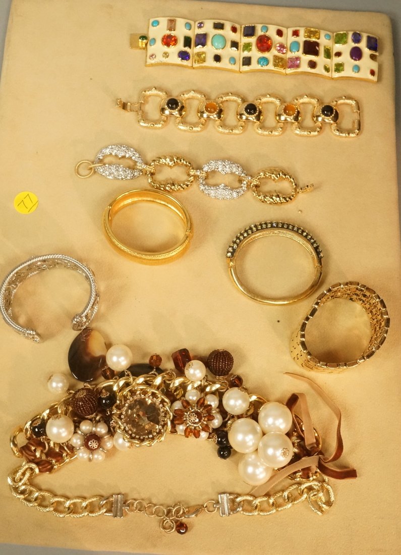 8pc Costume Jewelry Lot. Fabulous collection of M: 8pc Costume Jewelry Lot. Fabulous collection of Mostly gold tone jewelry. 1) Large Statement Runway Necklace on gold tone chain. 2) NOIR Cream enamel wide brac with colored stones. 3) Italian Link cha