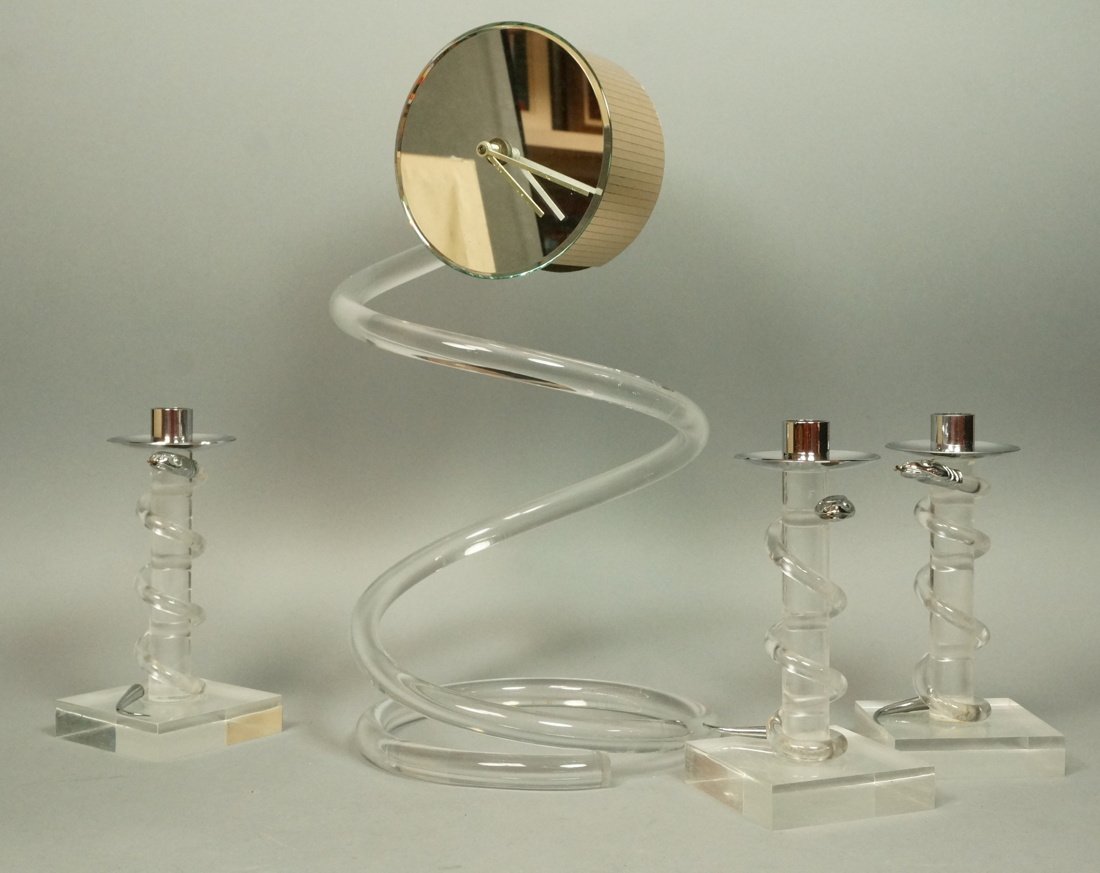 4 pcs Dorothy Thorpe Style Lucite. 3 Cobra rappe: 4 pcs Dorothy Thorpe Style Lucite. 3 Cobra rapped candlesticks and spring form clock.-- Dimensions: H: 17 inches: W: 9 inches --- US Shipping charge: $50