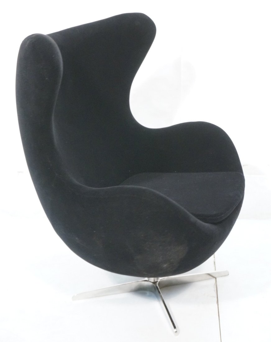 Contemporary Black Upholstered Egg Chair. Arne Ja: Contemporary Black Upholstered Egg Chair. Arne Jacobsen style. Short chrome pedestal base. -- Dimensions: H: 40.5 inches: W: 34 inches: D: 26.5 inches ---