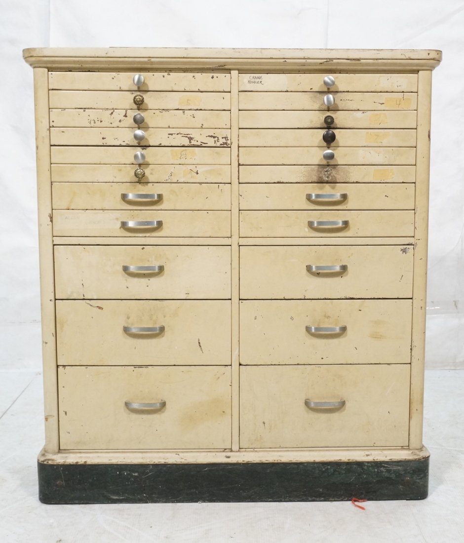 Painted white medical cabinet with 22 drawers.: Painted white medical cabinet with 22 drawers. -- Dimensions: H: 44 inches: W: 40 inches: D: 13.5 inches ---