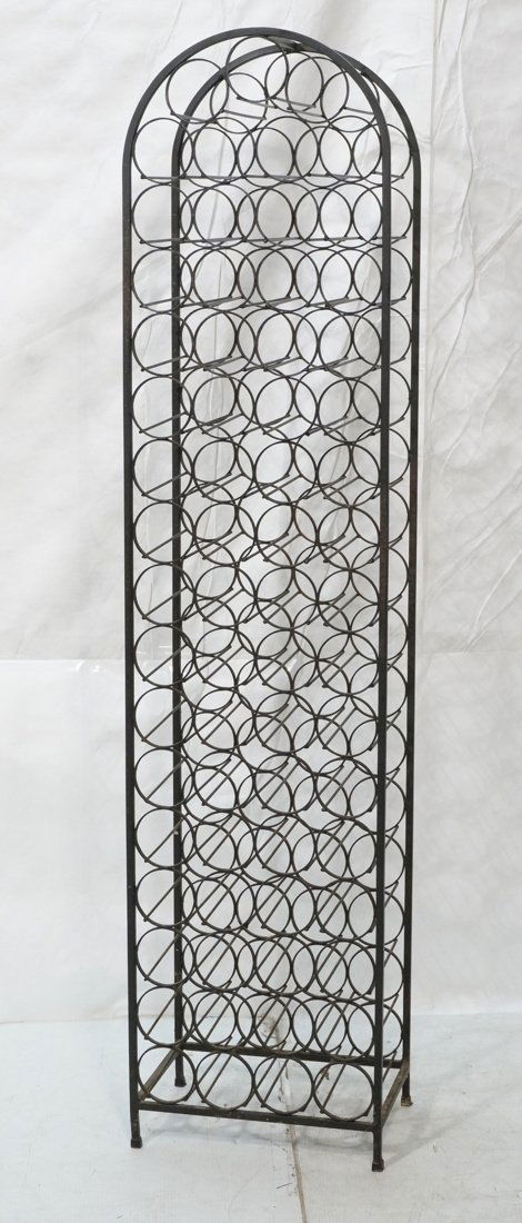 Tall Black Metal Arched Top Wine Rack. Modernist: Tall Black Metal Arched Top Wine Rack. Modernist-- Dimensions: H: 71.5 inches: W: 17 inches: D: 12.75 inches ---