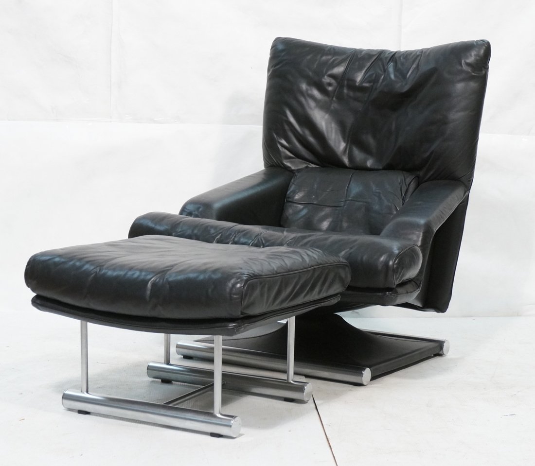 Black Leather Lounge Chair Ottoman. Stainless tub: Black Leather Lounge Chair Ottoman. Stainless tubular base frame. Chair swivels. CY MANN Designs, NY. -- Dimensions: H: 41 inches: W: 35 inches: D: 33 inches ---