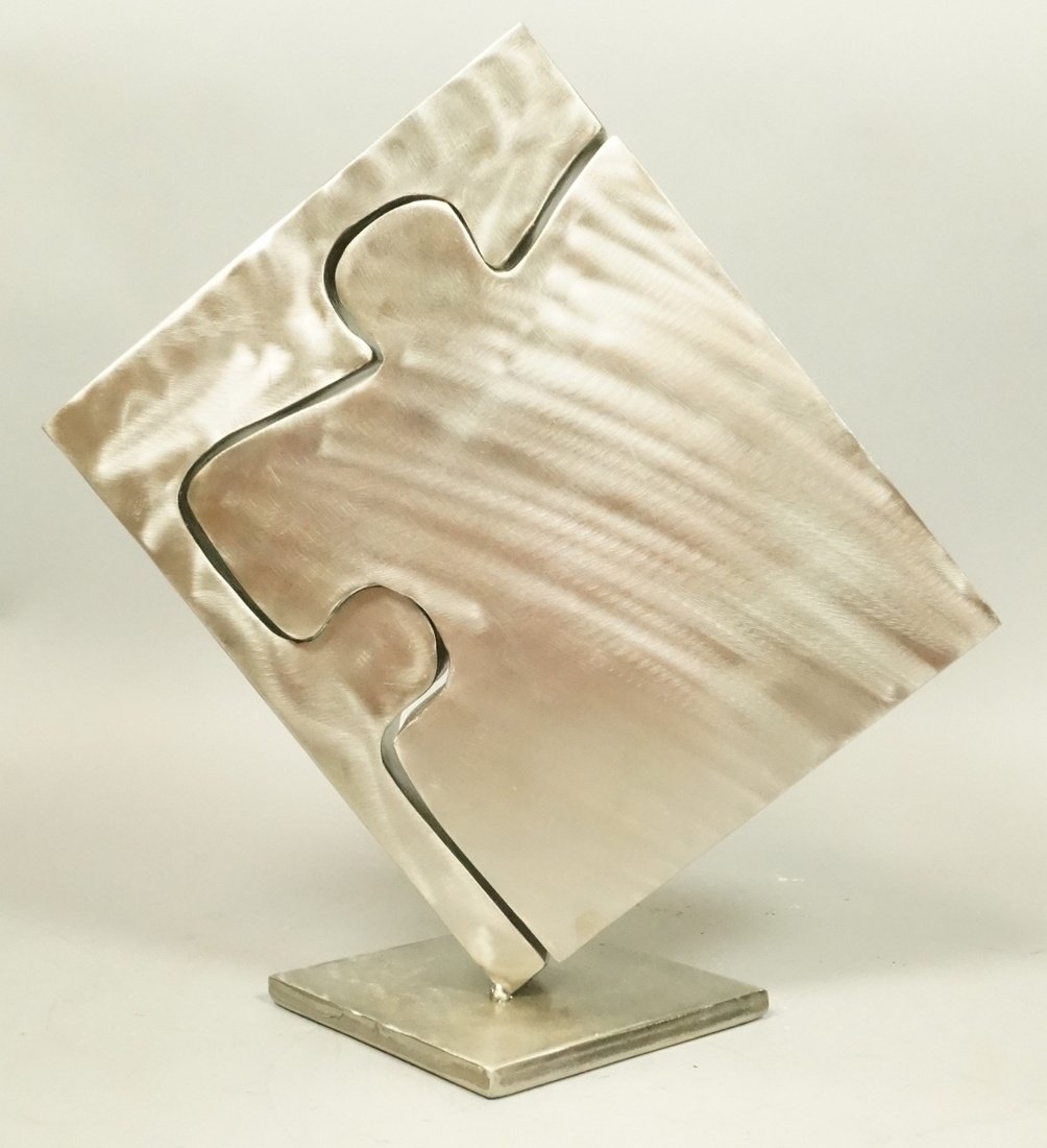 Hollow Sheet Metal Puzzle Modernist Table Sculptu: Hollow Sheet Metal Puzzle Modernist Table Sculpture. "Missing Piece" 7/23/11. Two pieces: comes apart-- Dimensions: H: 16 inches: W: 16 inches: D: 8 inches ---