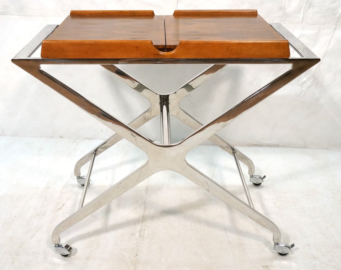 Modernist Italian style Chrome Serving Cart. Rose: Modernist Italian style Chrome Serving Cart. Rosewood Double Flip Out Top. Faux shagreen top exposed when top is flipped open. Chrome locking casters. -- Dimensions: H: 34 inches: W: 40 inches: D: 22