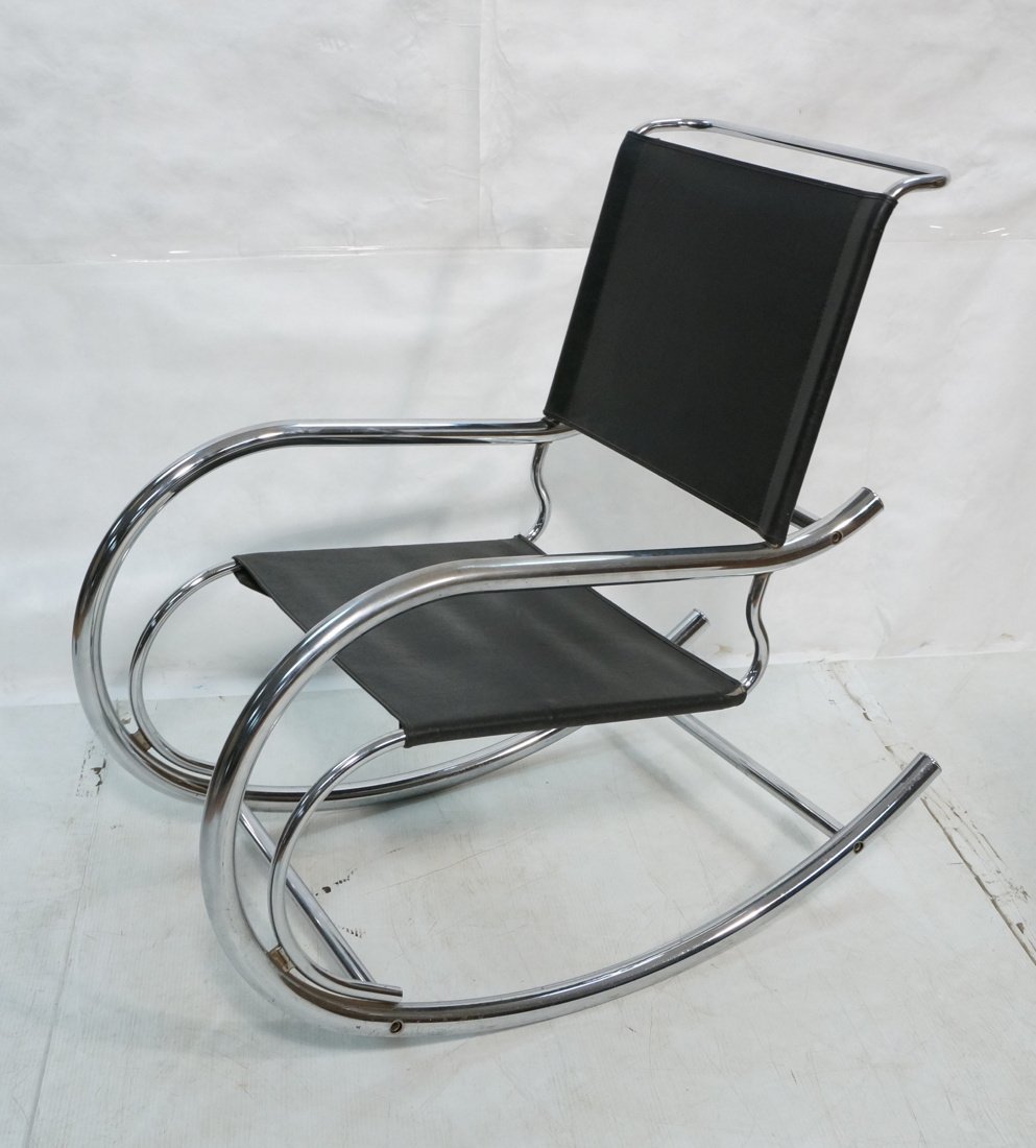 Chrome Frame Modernist Rocker Rocking Chair. Blac: Chrome Frame Modernist Rocker Rocking Chair. Black Vinyl upholstery with corseted closing. -- Dimensions: H: 38 inches: W: 21.75 inches: D: 40 inches ---