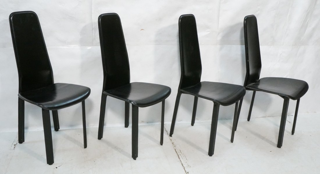 Set of 4 leather tall back dining chairs made by: Set of 4 leather tall back dining chairs made by Cidue. Made in Italy. All leather, metal framing-- Dimensions: H: 41 inches: W: 18 inches: D: 20 inches ---