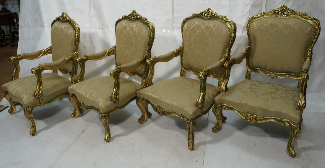 4pc Matching Gold Painted French Arm Chairs. Orna: 4pc Matching Gold Painted French Arm Chairs. Ornate Rose Floral Carved frame with damask green & gold fabric. Shaped Fronts-- Dimensions: H: 43.25 inches: W: 27.25 inches: D: 24 inches ---