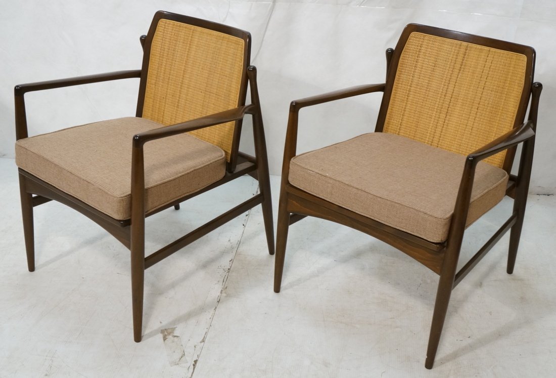 Pr SELIG Caned Back Lounge Chairs. Shaped Arms. T: Pr SELIG Caned Back Lounge Chairs. Shaped Arms. Tightly caned backs. Fabric seat cushions. Metal tag. -- Dimensions: H: 30 inches: W: 23.5 inches: D: 22 inches ---