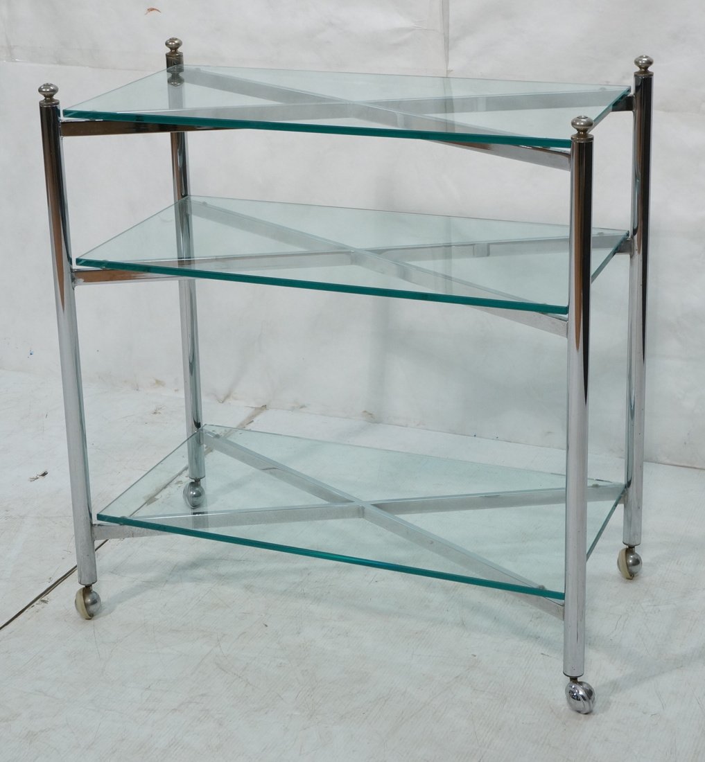 Chrome & Glass Bar Carts. Three .5" thick glass s: Chrome & Glass Bar Carts. Three .5" thick glass shelves. Three chrome X form supports. Casters. -- Dimensions: H: 36 inches: W: 34 inches: D: 18 inches ---