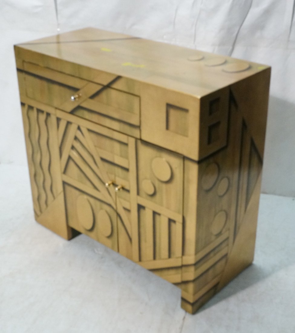 Decorator Gold Paint Cabinet. Modernist Art Deco: Decorator Gold Paint Cabinet. Modernist Art Deco relief and paint details. Gold cabinet with black highlights. -- Dimensions: H: 32 inches: W: 36 inches: D: 15.75 inches ---