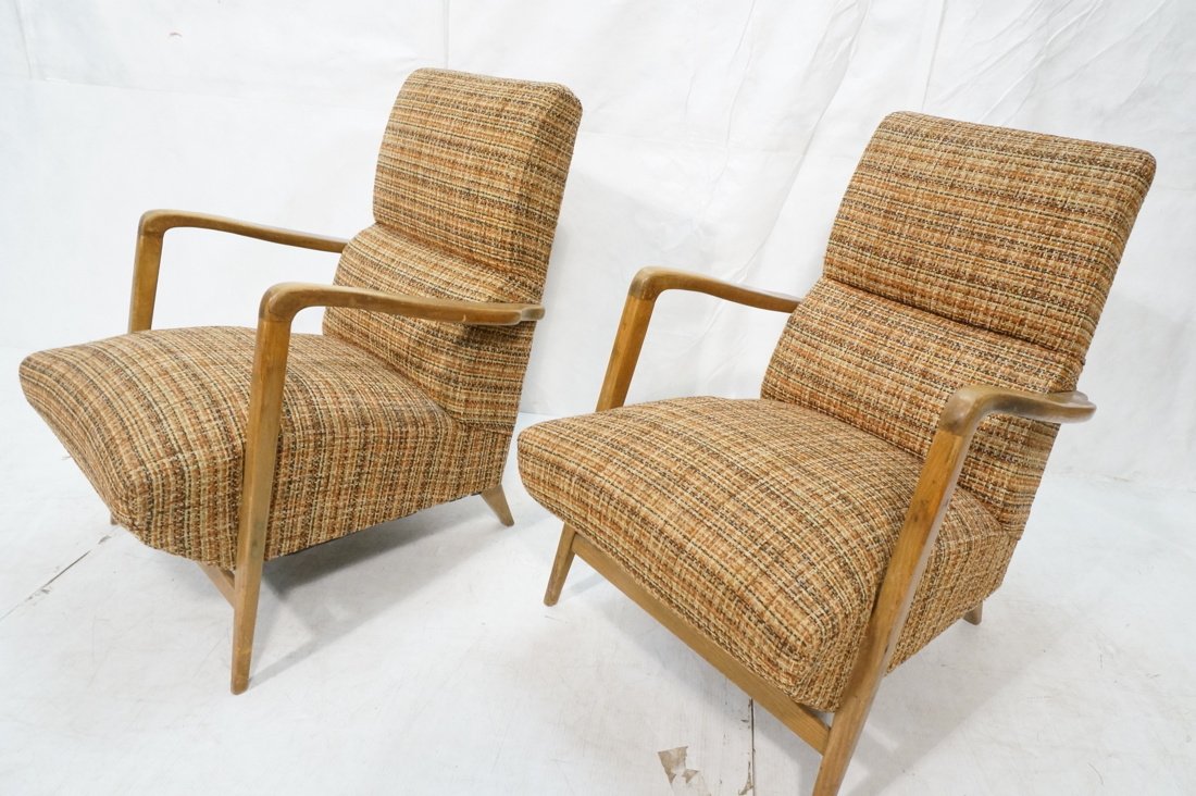Pr American Modern Wood Lounge Chairs. Brown, Cre: Pr American Modern Wood Lounge Chairs. Brown, Cream upholstered body with wood arms & Legs. Not Marked. -- Dimensions: H: 34.5 inches: W: 22.75 inches: D: 32 inches ---