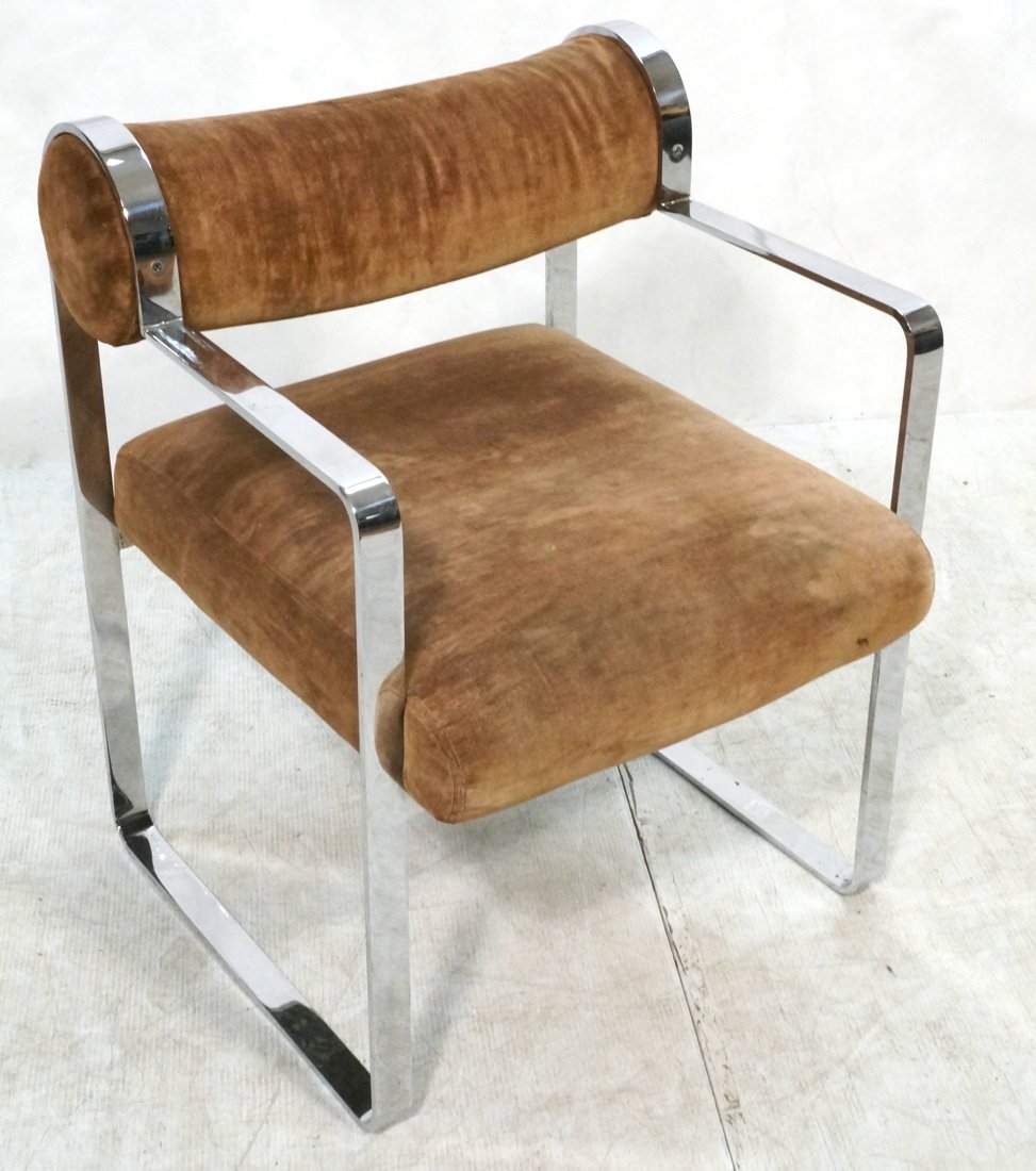 Baughman style chrome modernist lounge chair. Wid: Baughman style chrome modernist lounge chair. Wide flat chrome frame. Brown plush upholstery. Bolster style back rest.-- Dimensions: H: 32 inches: W: 24 inches: D: 22 inches ---