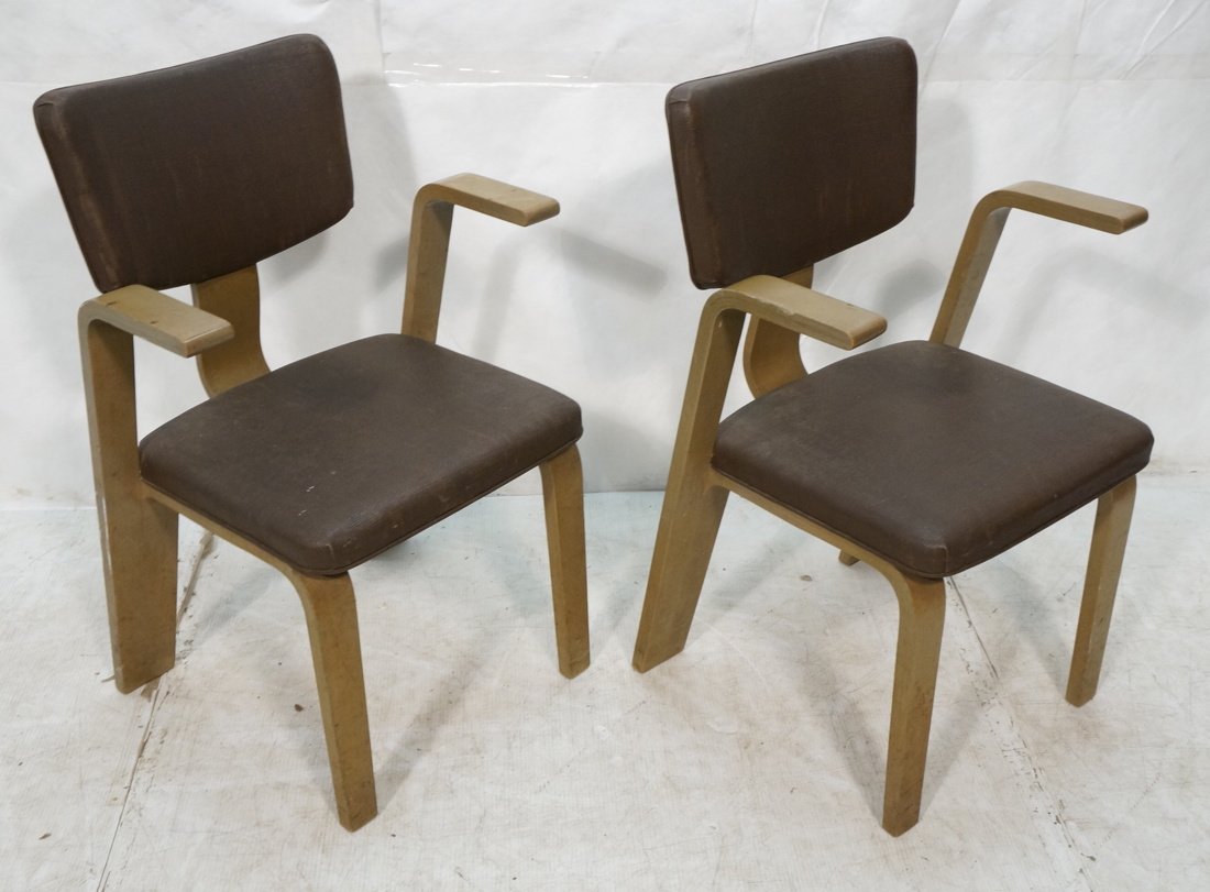 Pr THONET Laminated Wood Arm Side Chairs. Texture: Pr THONET Laminated Wood Arm Side Chairs. Textured vinyl upholstery. Metal tack trim. Tagged Thonet NY. -- Dimensions: H: 27.25 inches: W: 22.5 inches: D: 23 inches ---