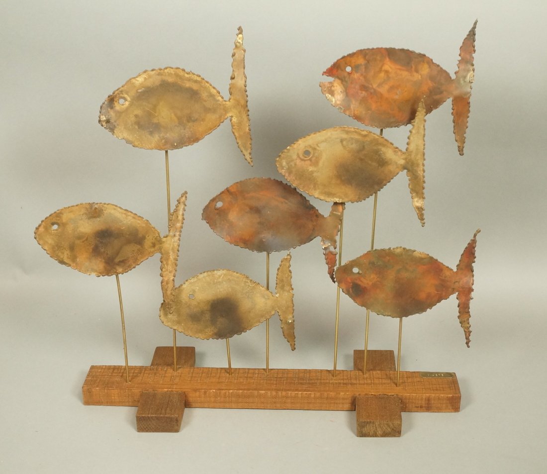 Signed C JERE School of Fish Metal Sculpture. Mou: Signed C JERE School of Fish Metal Sculpture. Mounted on wood base. Metal; JERE tag. -- Dimensions: H: 19 inches: W: 19 inches: D: 7 inches ---